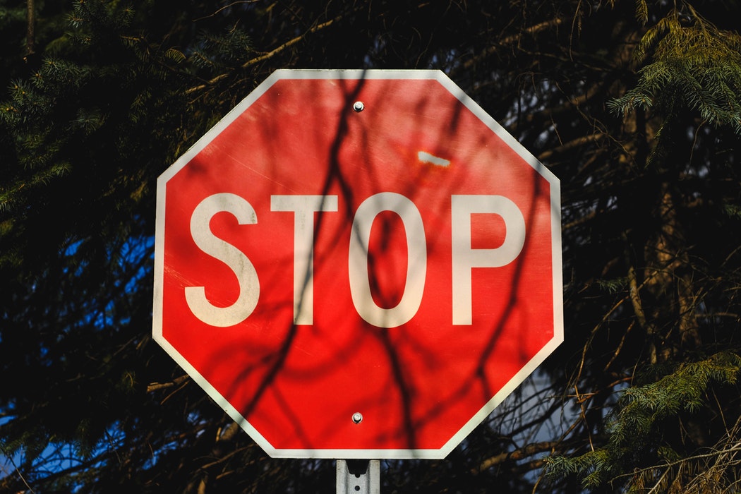 Stop sign illustrating common wine faults to avoid