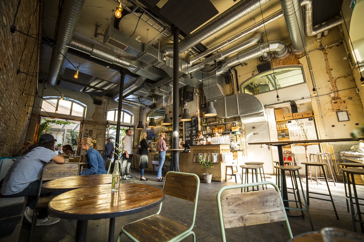 Diners inside a modern wine bar