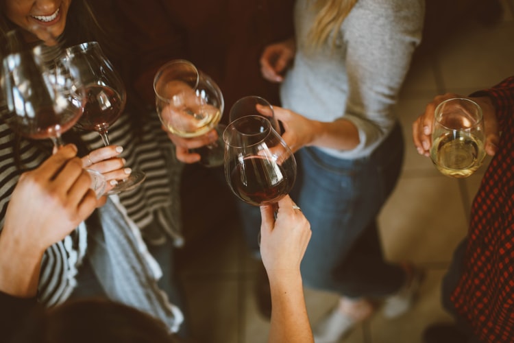 Friends toasting glasses of wine